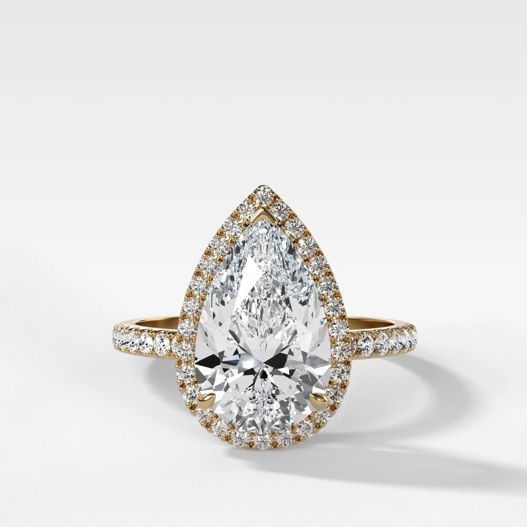 Aurora Pavé Halo Ring With Pear Cut
