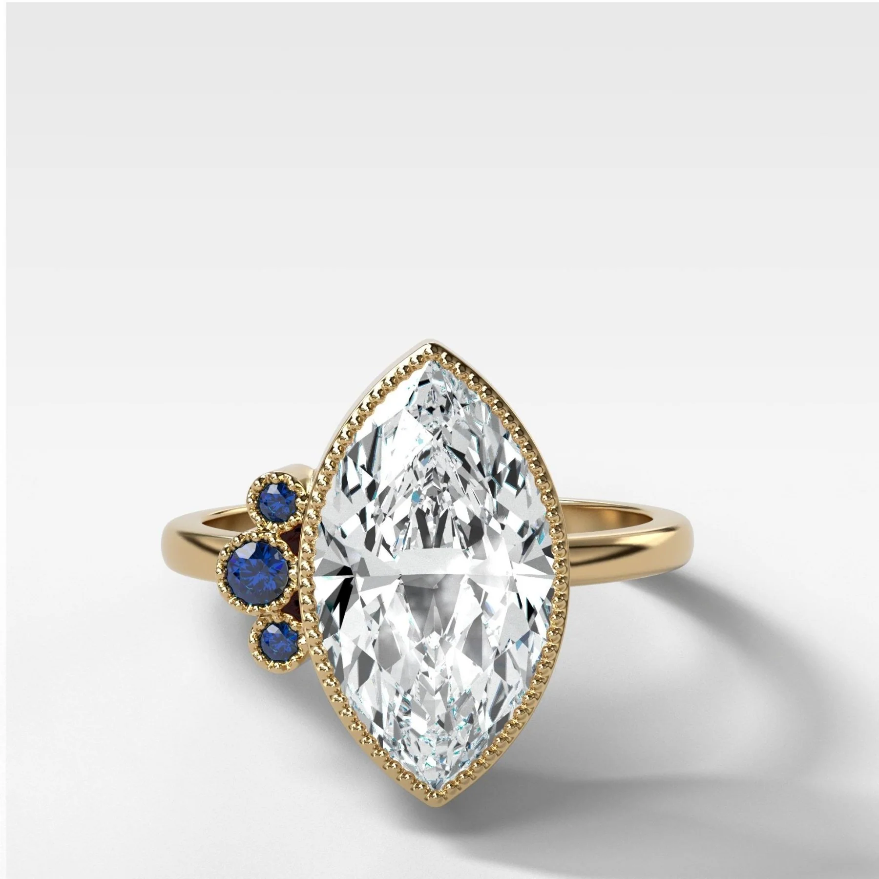 Blue Sapphire Cluster Engagement Ring With Marquise Cut