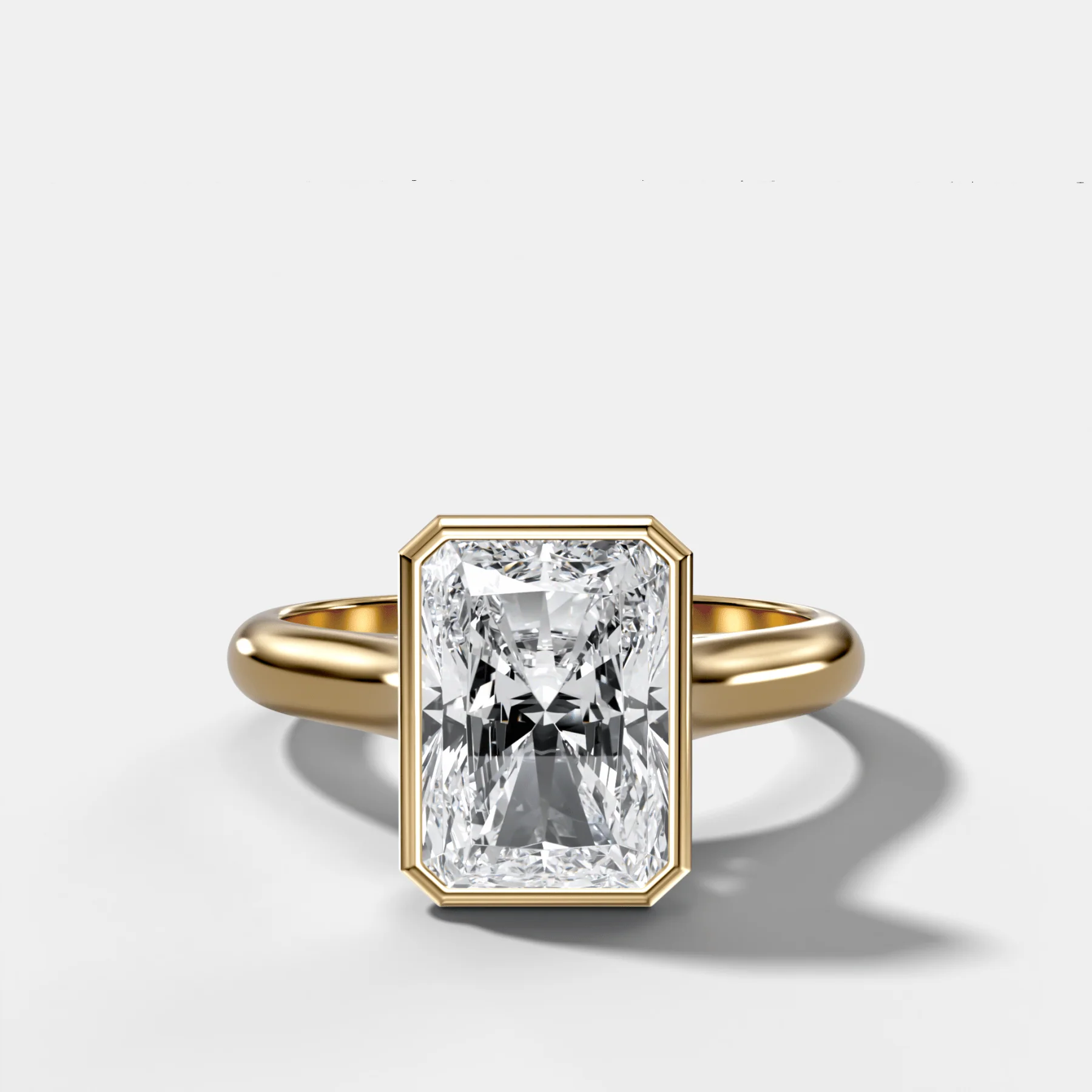 Cathedral Bezel Set Solitaire Engagement Ring With Elongated Radiant Diamond