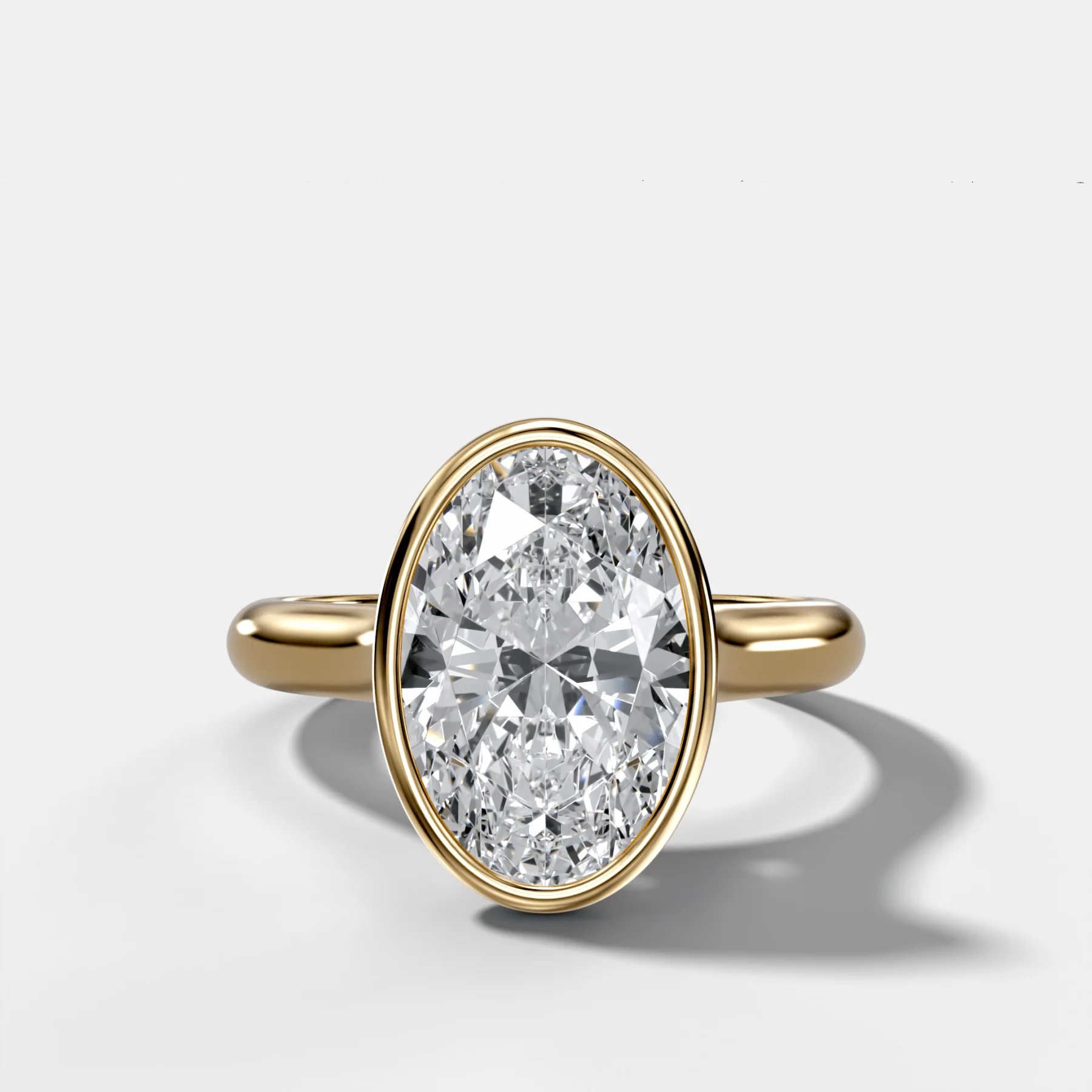Cathedral Bezel Set Solitaire Engagement Ring With Oval Diamond