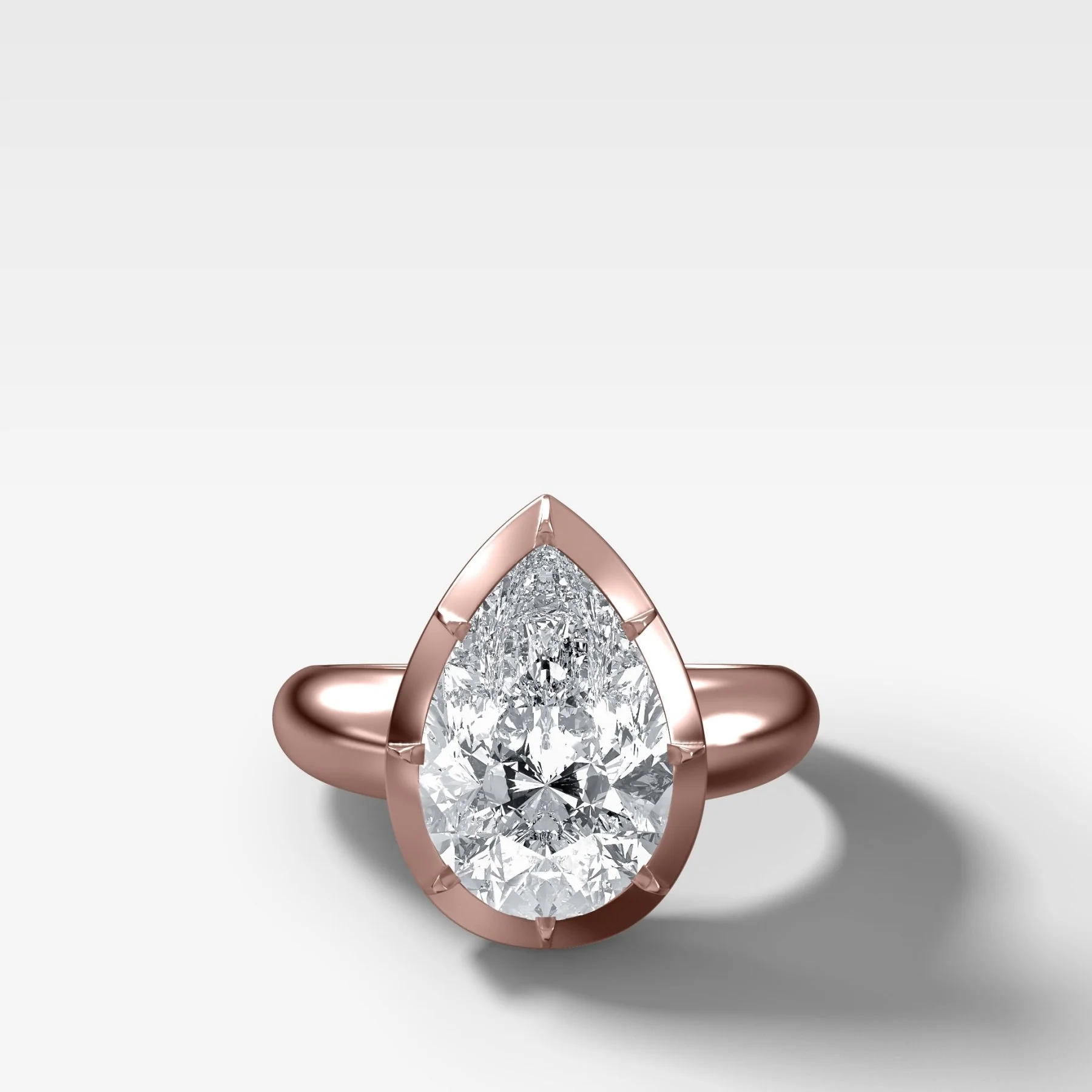 Club Button Back Engagement Ring with a Pear Cut Diamond - Image 4