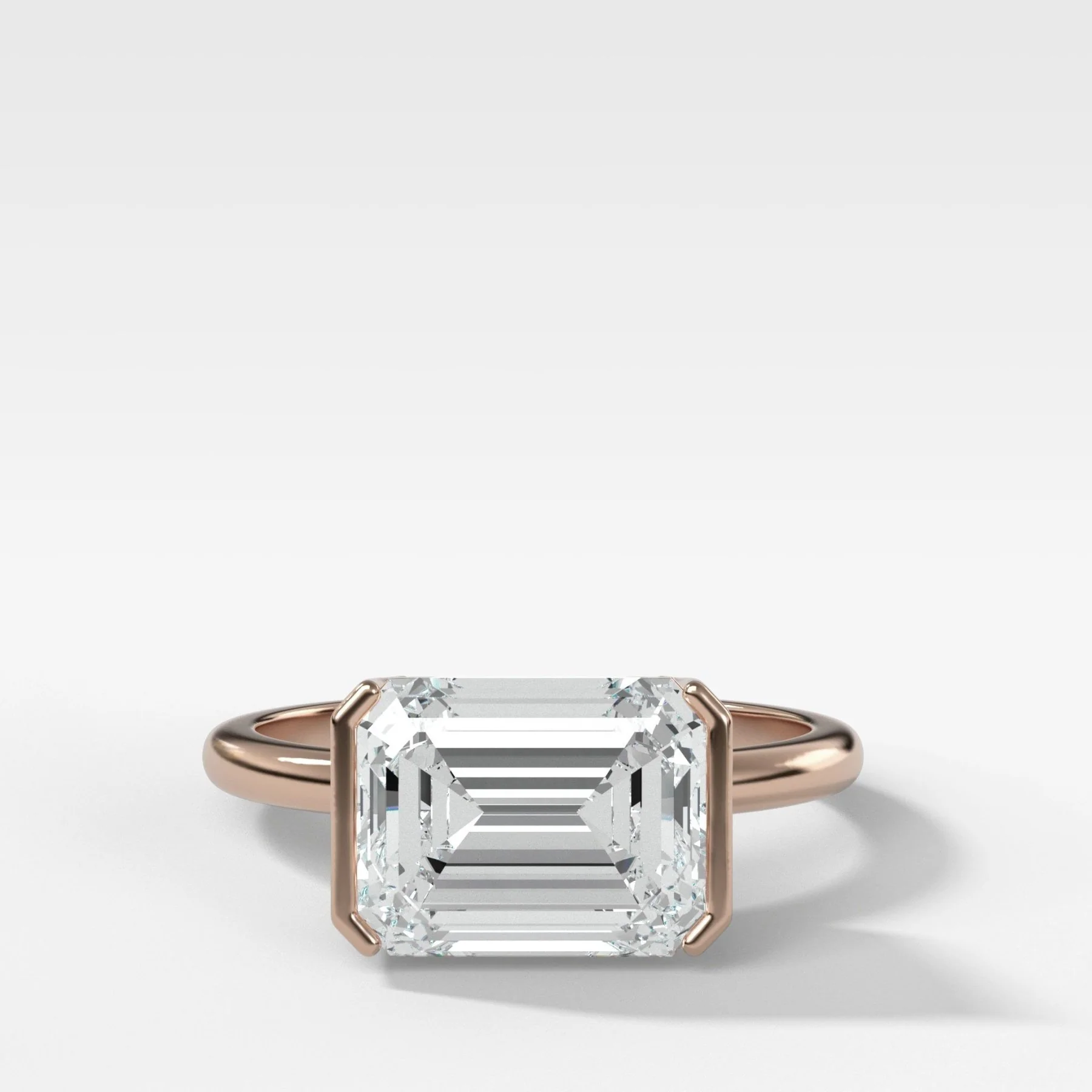 East West Half Bezel Solitaire Engagement Ring With Emerald Cut Diamond - Image 7