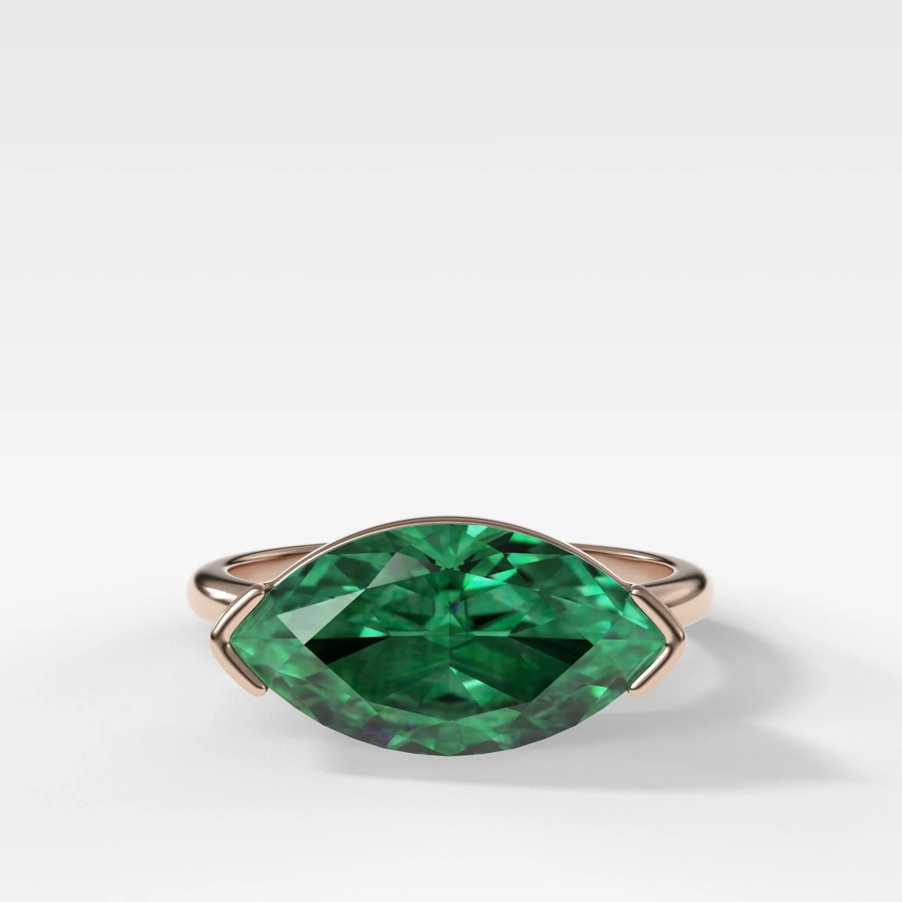 East West Half Bezel Solitaire Engagement Ring With Marquise Cut Green Emerald - Image 4