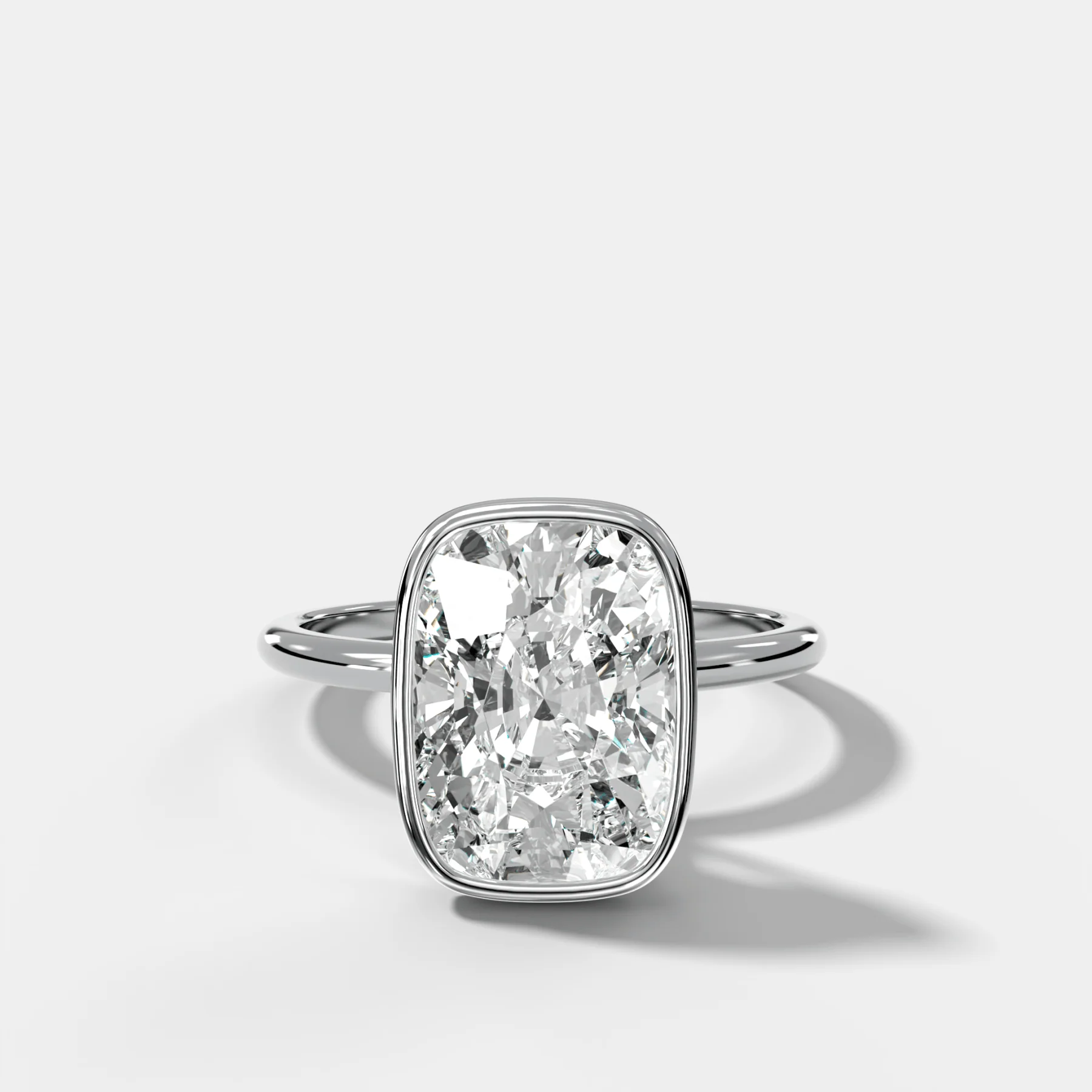 Penumbra Bezel Hidden Halo Engagement Ring with Elongated Cushion Cut - Image 5