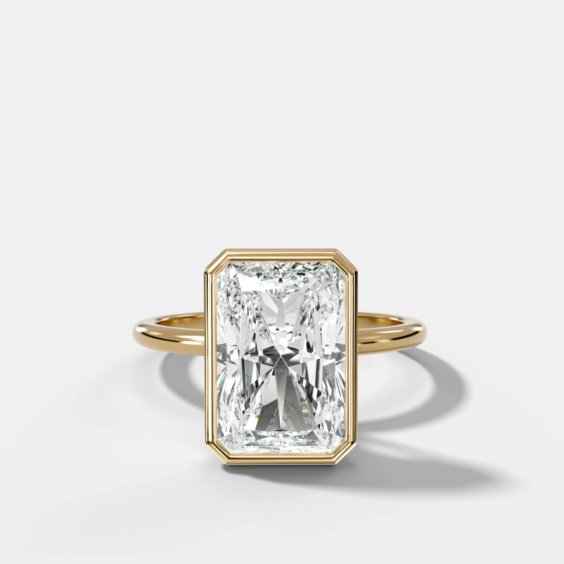 Penumbra Bezel Hidden Halo Engagement Ring with Elongated Radiant Cut