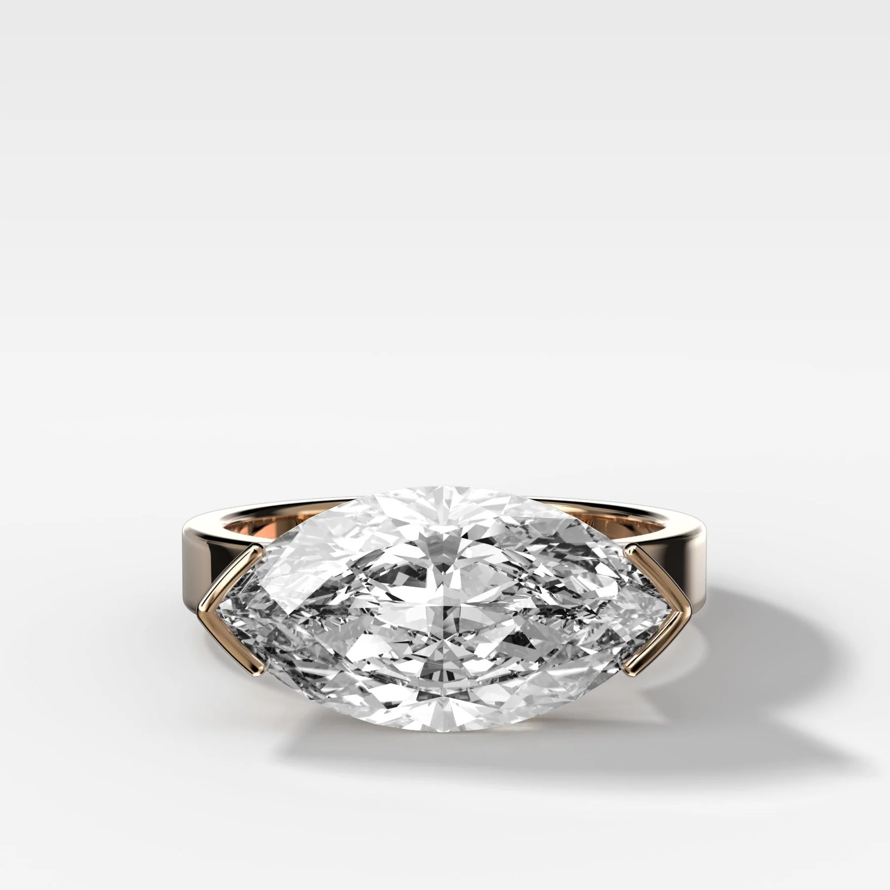 Finest Half Bezel Solitaire Engagement Ring With East West Marquise Cut Diamond