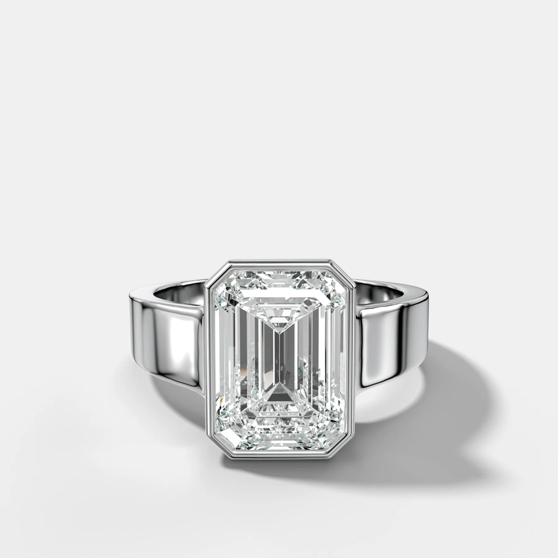 Finest Tapered Bezel Set Engagement Ring With Emerald Cut Diamond - Image 3