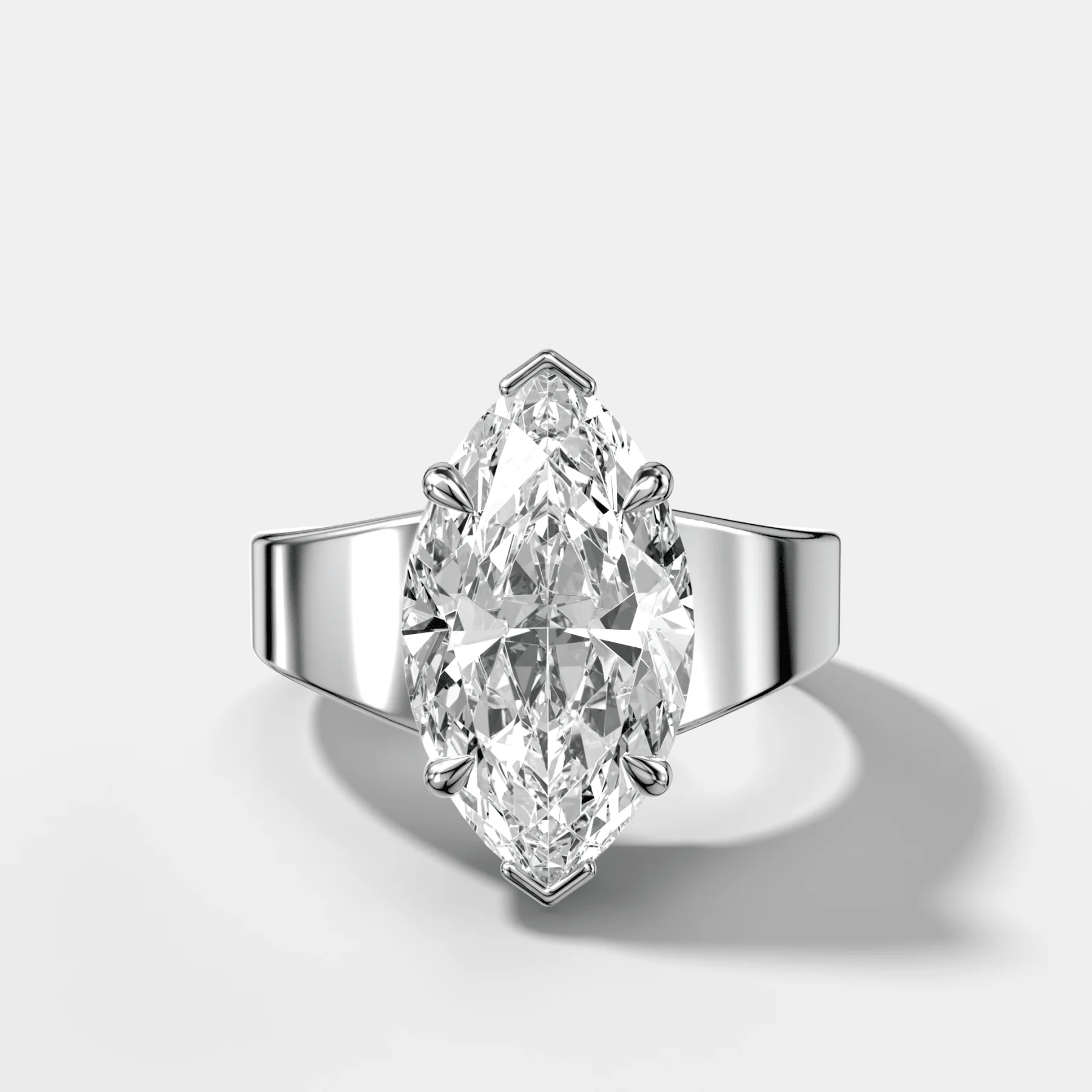 Finest Tapered Engagement Ring With Marquise Cut Diamond - Image 3