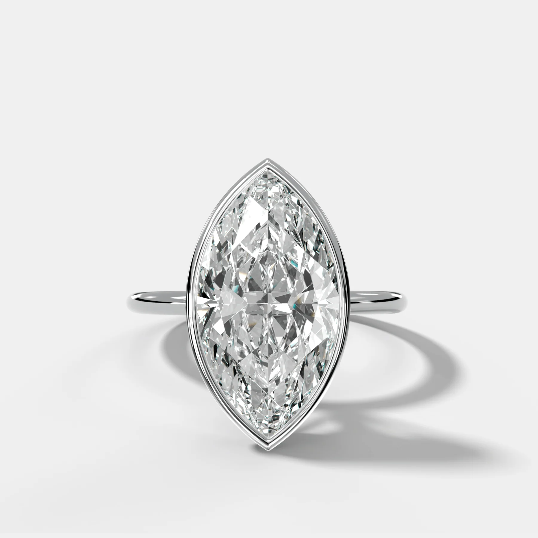 Penumbra Bezel Hidden Halo Engagement Ring with Marquise Cut - Image 3