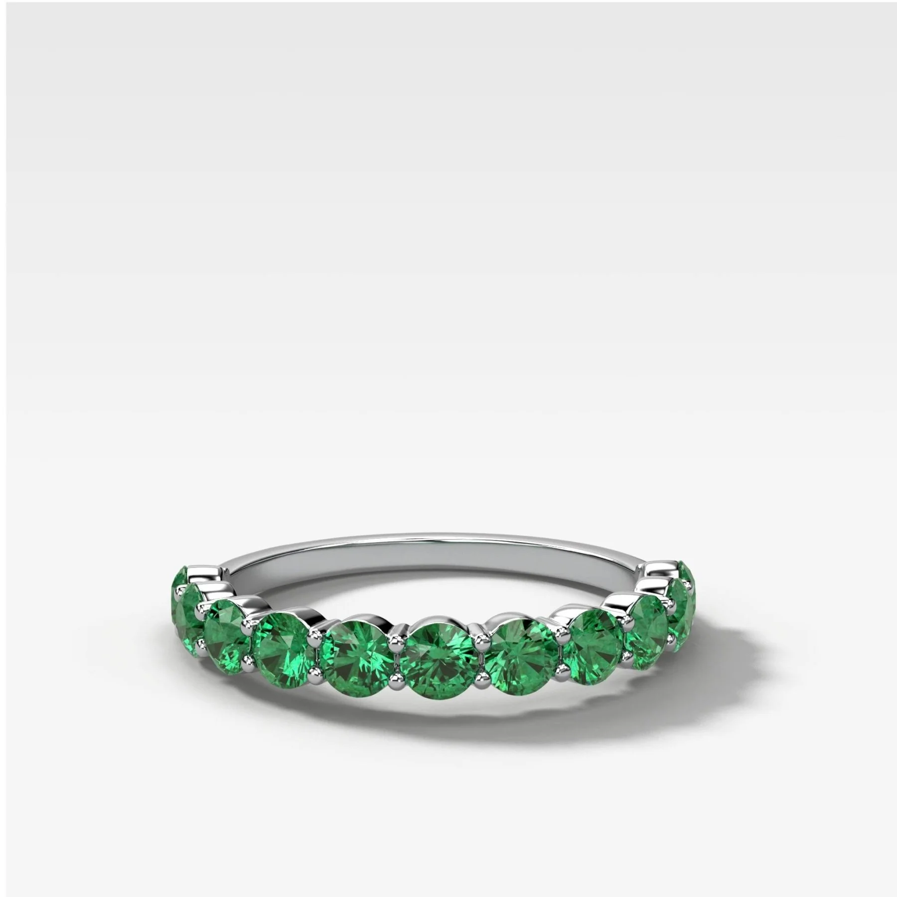 Shared Prong Wedding Band With Green Emeralds - Image 3