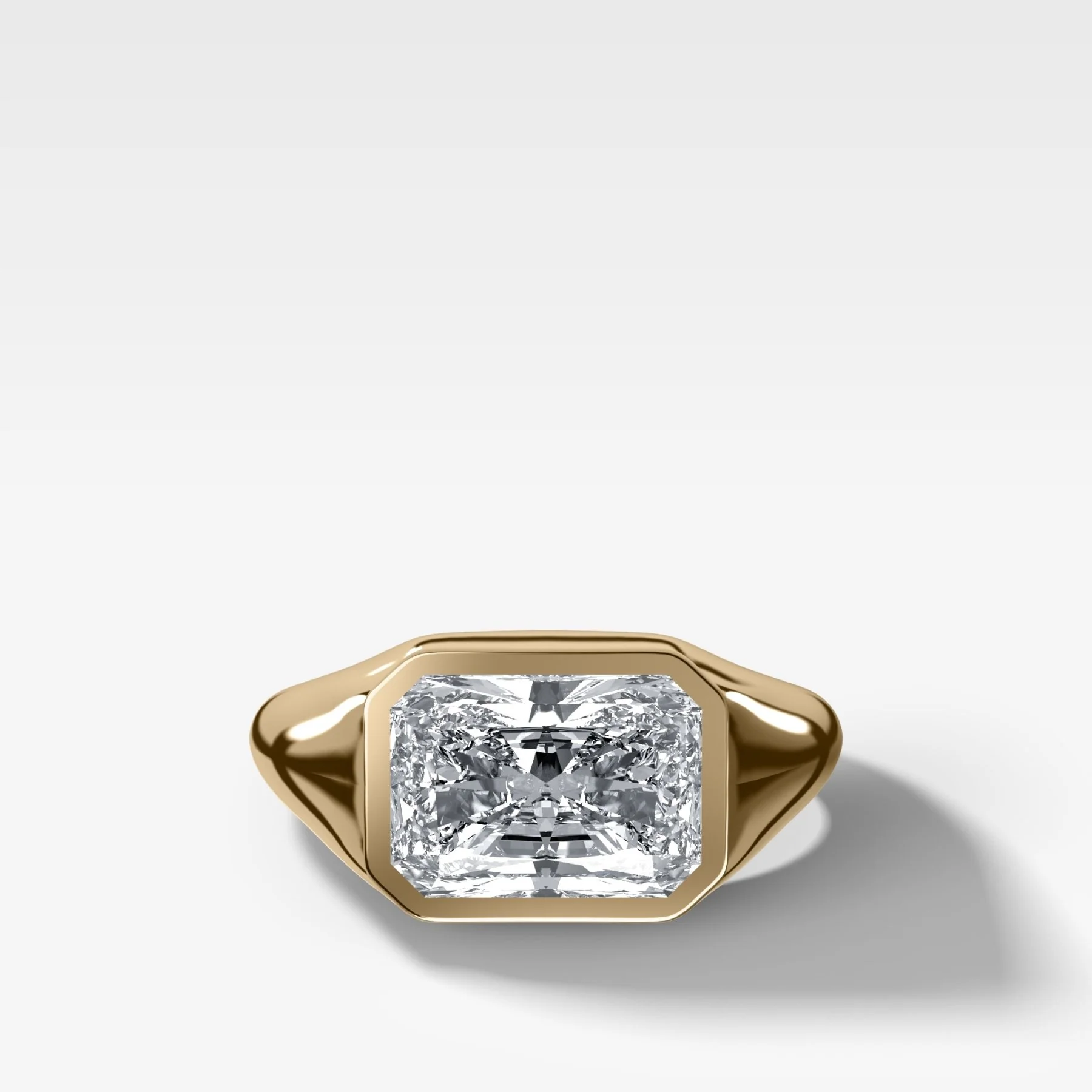 Tapered Bezel Signet Engagement Ring with East West Elongated Radiant Cut Diamond