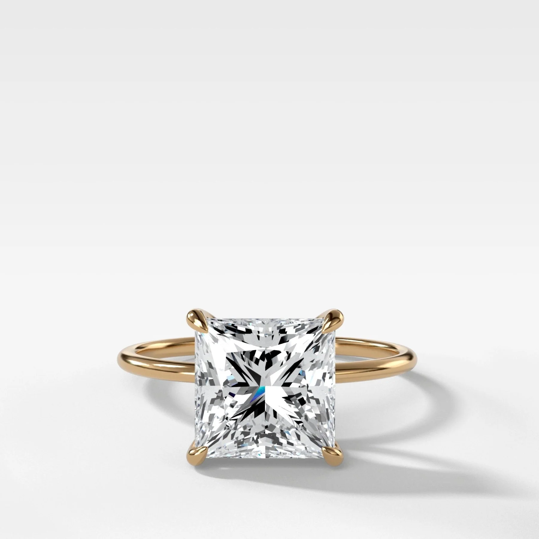 Thin + Simple Solitaire Engagement Ring With Princess Cut Diamond
