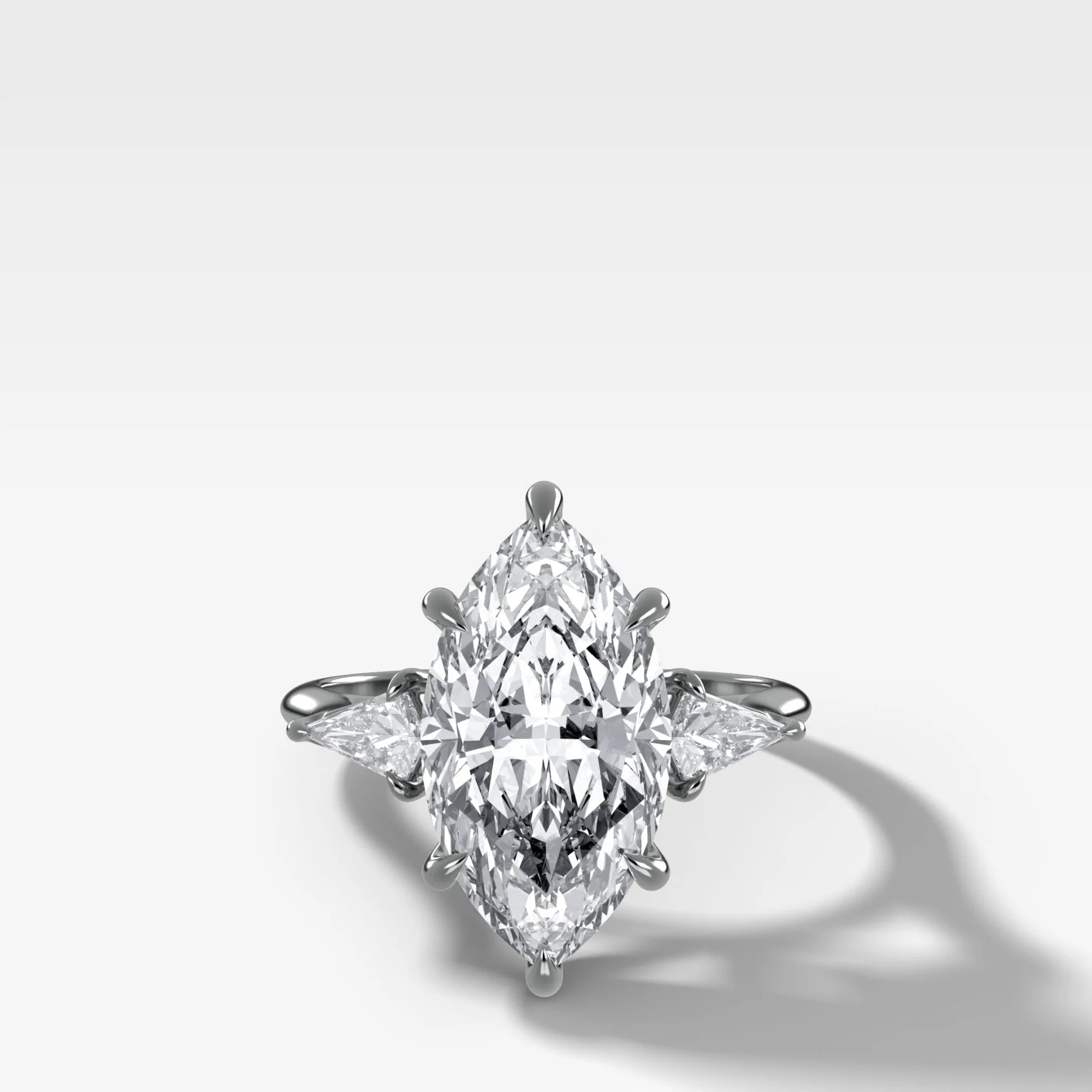 Three Stone Engagement Ring With Kite Side Stones and Marquise Cut Diamond - Image 3